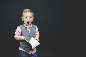 How To Encourage My Kid To Read? (12 Tips)